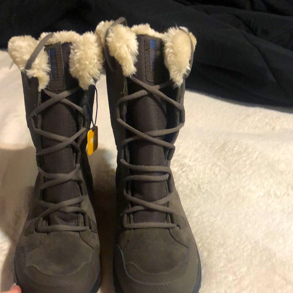 These ice maiden boots are brand new with tags. They value at $129.00
